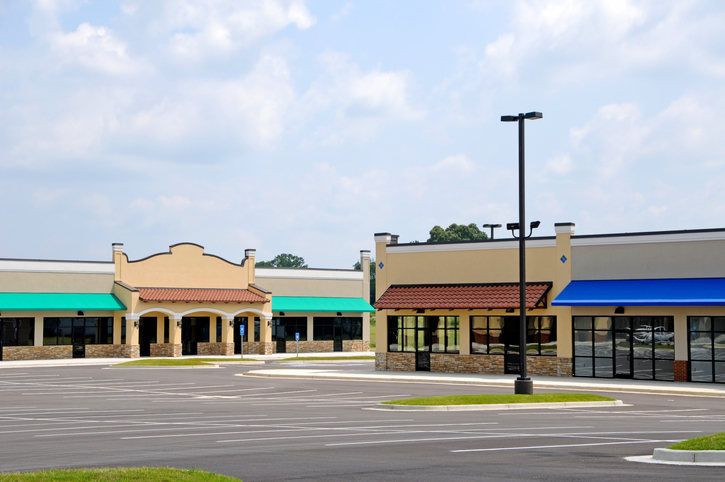 Empty Strip Mall Commercial store fronts in an empty shopping center due to the possible increase in e-commerce