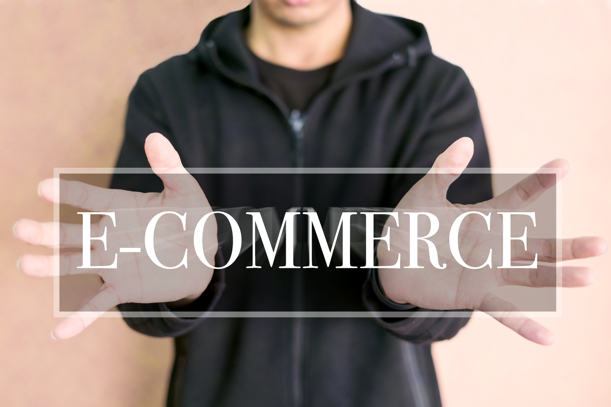 E-commerce concept on a digital screen in human hand E-commerce processing concept on a digital screen in human hand