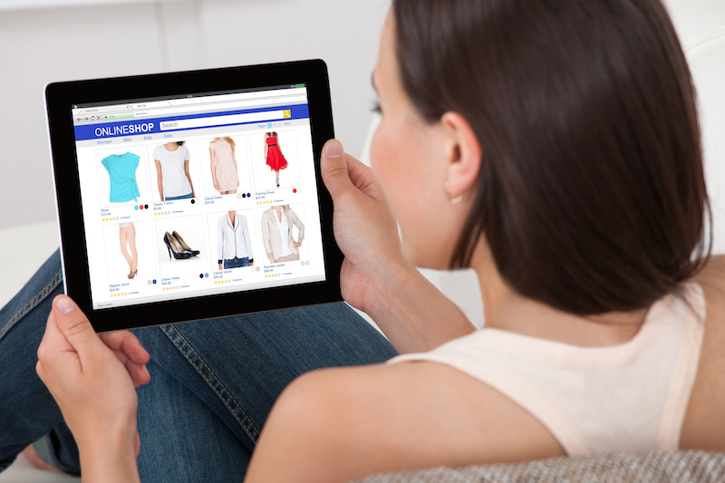 Woman Holding Digital Tablet With Blank Screen The Top Seven BigCommerce Integrations for 2020